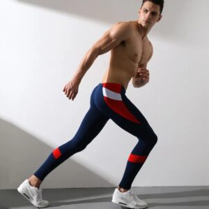 Pantalones largos de cintura baja para hombre, mallas de retazos sólidos, ropa interior elástica, suave y cómoda, a la moda